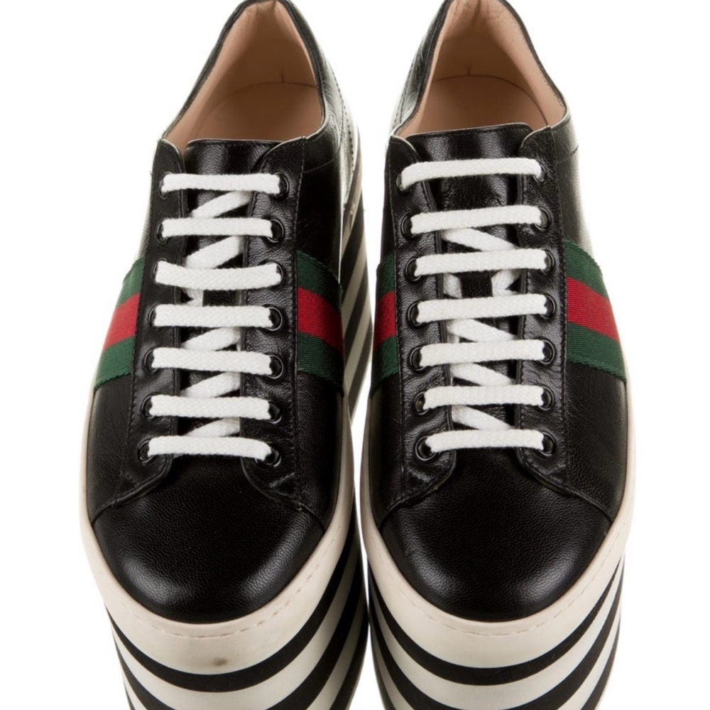 Stylish Black Leather Sneakers with Stripes